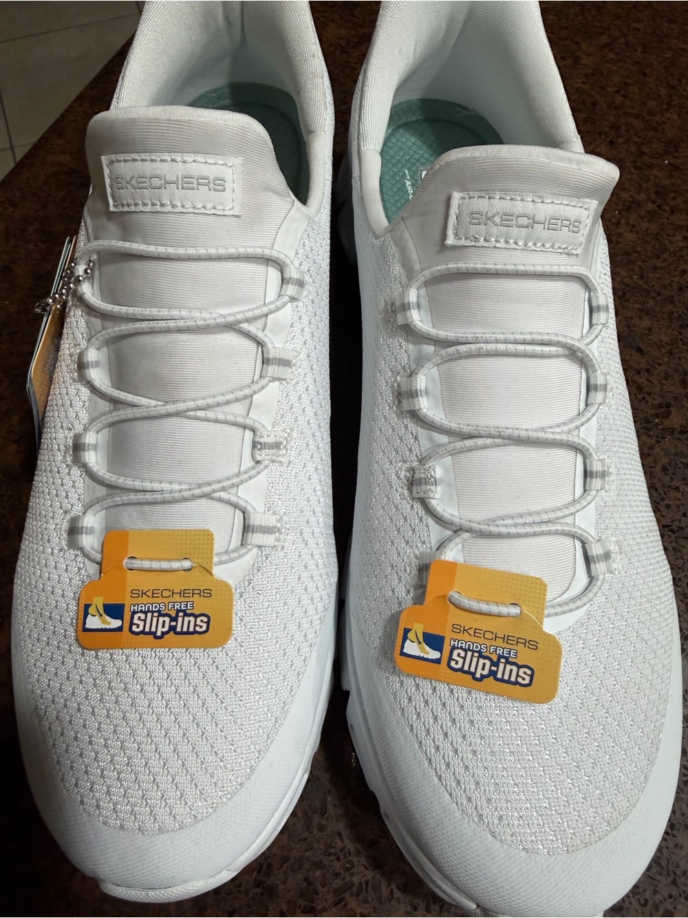 Skechers White Slip-On Sneakers with Mint Insole